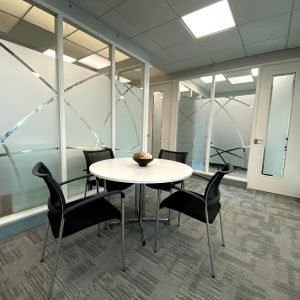 Business Centre break out area with tables and chairs